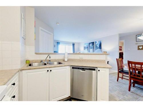 1314-12A Ironside Street, Red Deer, AB - Indoor Photo Showing Kitchen With Double Sink