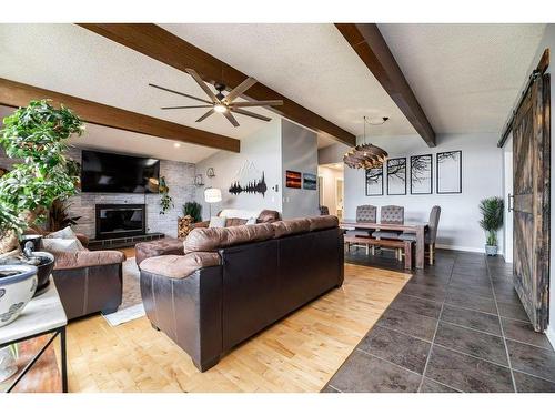 5321 46 Avenue, Rimbey, AB - Indoor Photo Showing Living Room With Fireplace