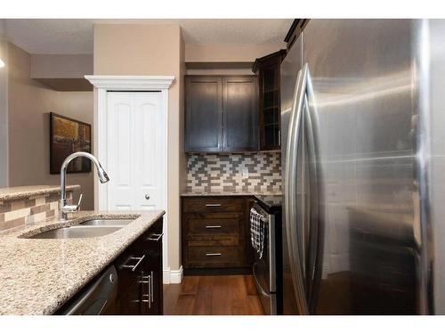 101-9919 Gordon Avenue, Fort Mcmurray, AB - Indoor Photo Showing Kitchen With Double Sink