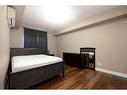 101-9919 Gordon Avenue, Fort Mcmurray, AB  - Indoor Photo Showing Bedroom 