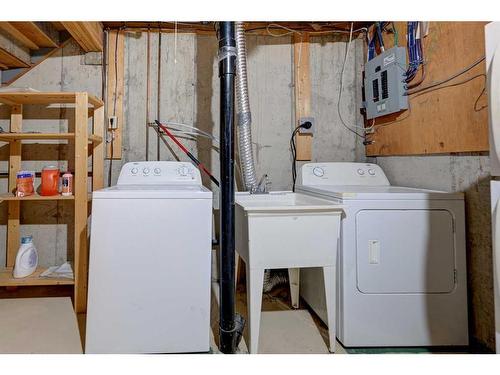 77 Baile Close North, Red Deer, AB - Indoor Photo Showing Laundry Room