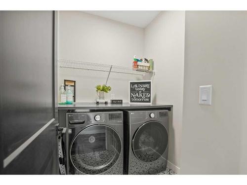 16 Ian Way, Sylvan Lake, AB - Indoor Photo Showing Laundry Room