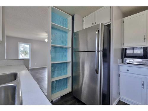 4820 55 Avenue, Camrose, AB - Indoor Photo Showing Kitchen With Double Sink