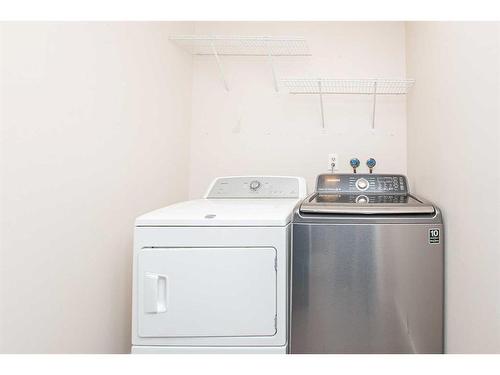 5007 58 Street, Lacombe, AB - Indoor Photo Showing Laundry Room