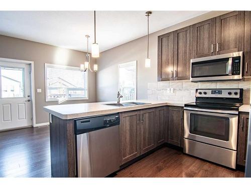 89 Crimson Court, Blackfalds, AB - Indoor Photo Showing Kitchen With Stainless Steel Kitchen With Upgraded Kitchen