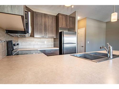 89 Crimson Court, Blackfalds, AB - Indoor Photo Showing Kitchen With Stainless Steel Kitchen With Double Sink