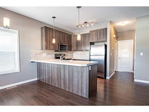 89 Crimson Court, Blackfalds, AB - Indoor Photo Showing Kitchen With Stainless Steel Kitchen With Upgraded Kitchen