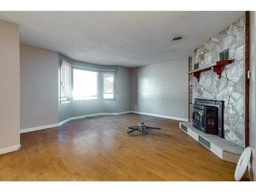 5741 35 Street, Red Deer, AB - Indoor With Fireplace