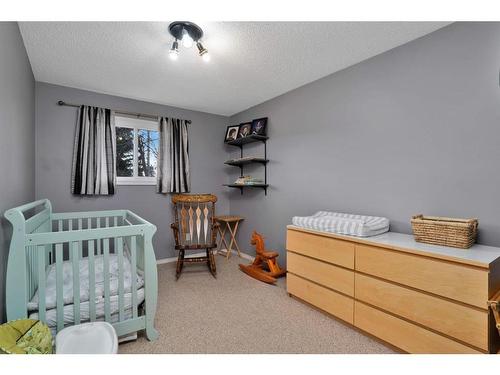 5608 56A Avenue, Rocky Mountain House, AB - Indoor Photo Showing Bedroom