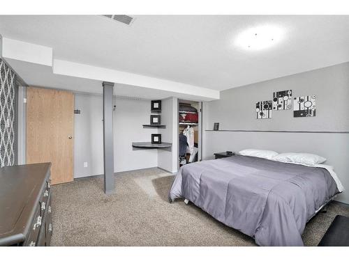 5608 56A Avenue, Rocky Mountain House, AB - Indoor Photo Showing Bedroom