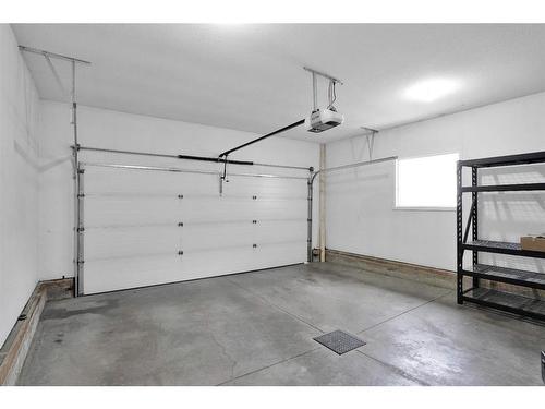 656 Robinson Avenue, Penhold, AB - Indoor Photo Showing Garage