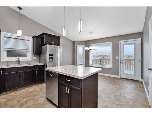 656 Robinson Avenue, Penhold, AB - Indoor Photo Showing Kitchen With Double Sink