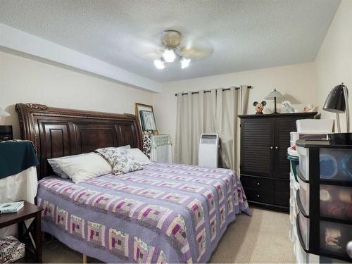 102-4904 54 Street West, Red Deer, AB - Indoor Photo Showing Bedroom