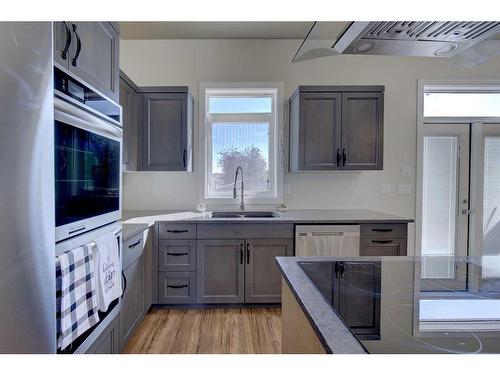 A/B-5333 76 Street, Red Deer, AB - Indoor Photo Showing Kitchen With Double Sink