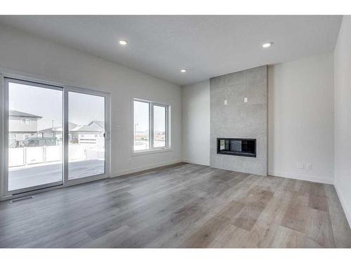 12 Ian Way, Sylvan Lake, AB - Indoor With Fireplace