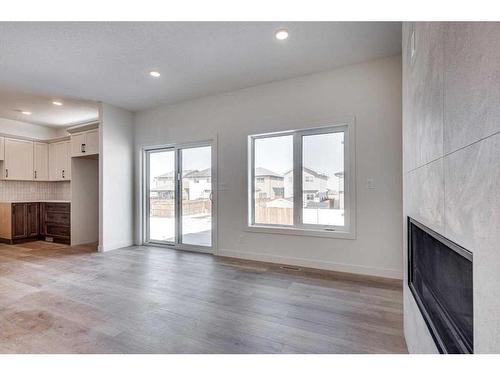 12 Ian Way, Sylvan Lake, AB - Indoor With Fireplace