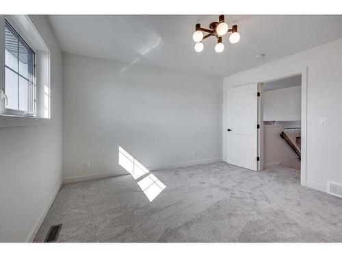 12 Ian Way, Sylvan Lake, AB - Indoor Photo Showing Other Room