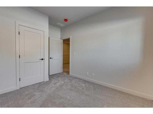 12 Ian Way, Sylvan Lake, AB - Indoor Photo Showing Other Room