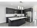 33 Athens Road, Blackfalds, AB  - Indoor Photo Showing Kitchen With Double Sink With Upgraded Kitchen 