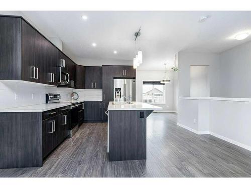 33 Athens Road, Blackfalds, AB - Indoor Photo Showing Kitchen With Upgraded Kitchen