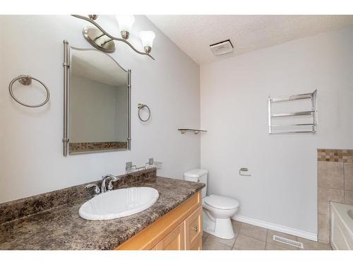 4515 48 Street, Innisfail, AB - Indoor Photo Showing Bathroom