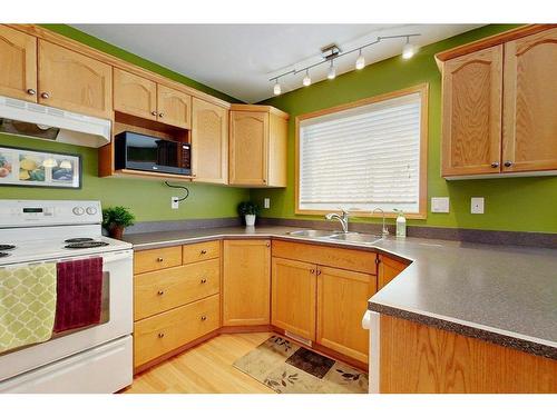 4804 Lake Street, Alix, AB - Indoor Photo Showing Kitchen With Double Sink