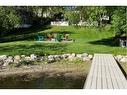 4804 Lake Street, Alix, AB  - Outdoor With Body Of Water With Backyard 