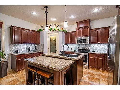 100 Vincent Close, Red Deer, AB - Indoor Photo Showing Kitchen With Stainless Steel Kitchen With Double Sink