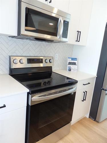 45 Inglis Crescent, Sylvan Lake, AB - Indoor Photo Showing Kitchen