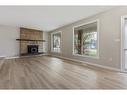 112 Sanden Street, Bawlf, AB  - Indoor Photo Showing Living Room With Fireplace 