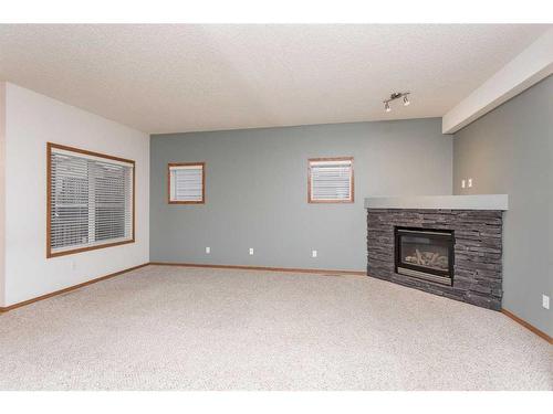 19 Jones Crescent, Red Deer, AB - Indoor With Fireplace