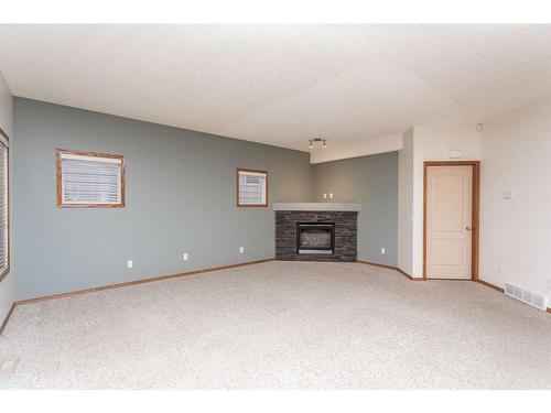 19 Jones Crescent, Red Deer, AB - Indoor With Fireplace