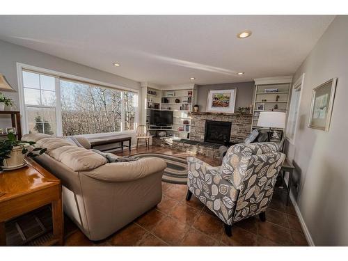 26458 Township Road 382, Rural Red Deer County, AB - Indoor Photo Showing Living Room With Fireplace