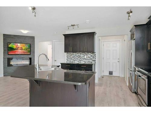 28 Almond Crescent, Blackfalds, AB - Indoor Photo Showing Kitchen With Stainless Steel Kitchen With Upgraded Kitchen