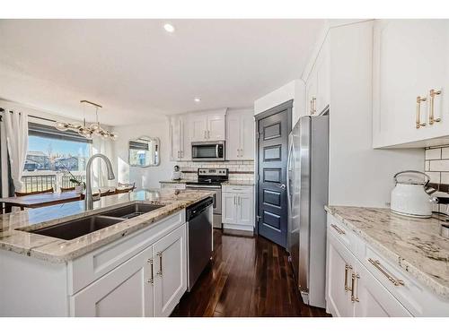 2 Grove Close, Red Deer, AB - Indoor Photo Showing Kitchen With Double Sink With Upgraded Kitchen