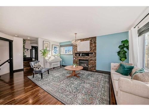 2 Grove Close, Red Deer, AB - Indoor Photo Showing Living Room With Fireplace