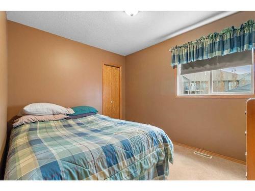 13 Westwood Court South, Sylvan Lake, AB - Indoor Photo Showing Bedroom