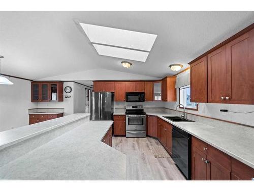 4910 52 Street, Lougheed, AB - Indoor Photo Showing Kitchen With Double Sink