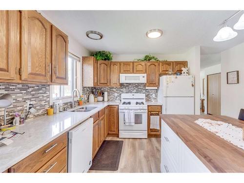 5416 50 Street, Rimbey, AB - Indoor Photo Showing Kitchen With Double Sink