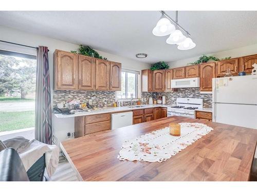 5416 50 Street, Rimbey, AB - Indoor Photo Showing Kitchen With Double Sink