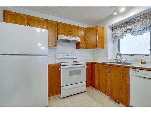 37 Liberty Close, Lacombe, AB - Indoor Photo Showing Kitchen With Double Sink