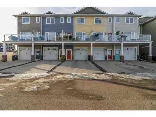 108-5210 Lakeshore Drive, Sylvan Lake, AB - Outdoor With Deck Patio Veranda With Facade