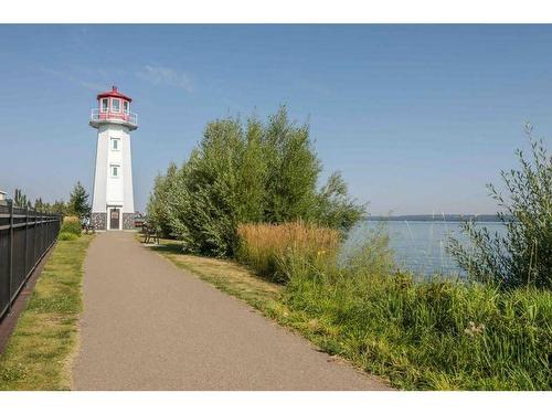 108-5210 Lakeshore Drive, Sylvan Lake, AB - Outdoor With Body Of Water With View