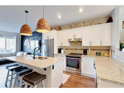 108-5210 Lakeshore Drive, Sylvan Lake, AB - Indoor Photo Showing Kitchen With Double Sink With Upgraded Kitchen