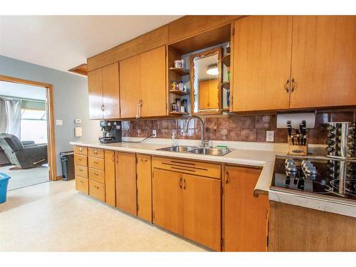 4607 55 Street, Stettler, AB - Indoor Photo Showing Kitchen With Double Sink