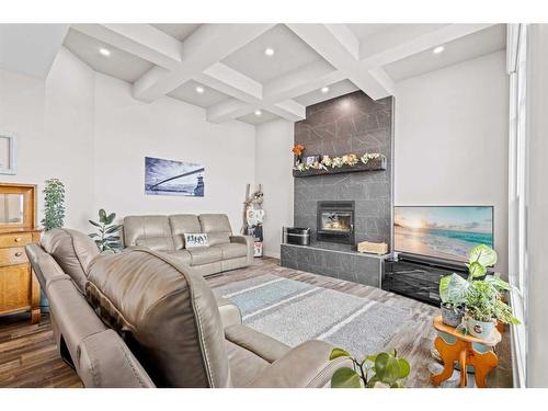 263046 Township Road 431, Ponoka, AB - Indoor Photo Showing Living Room With Fireplace