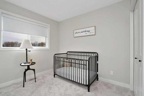 54 Irvin Way, Sylvan Lake, AB - Indoor Photo Showing Bedroom