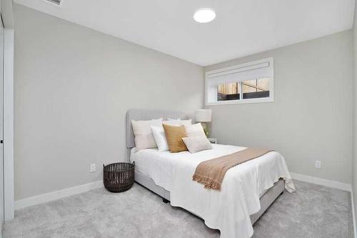 54 Irvin Way, Sylvan Lake, AB - Indoor Photo Showing Bedroom