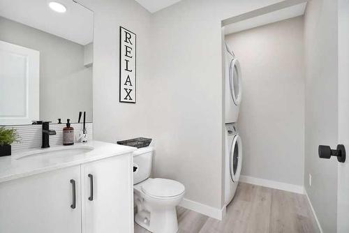 54 Irvin Way, Sylvan Lake, AB - Indoor Photo Showing Laundry Room