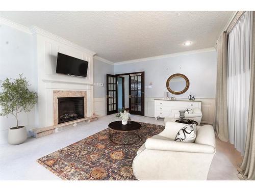 170 Jarvis Bay Drive, Jarvis Bay, AB - Indoor Photo Showing Living Room With Fireplace